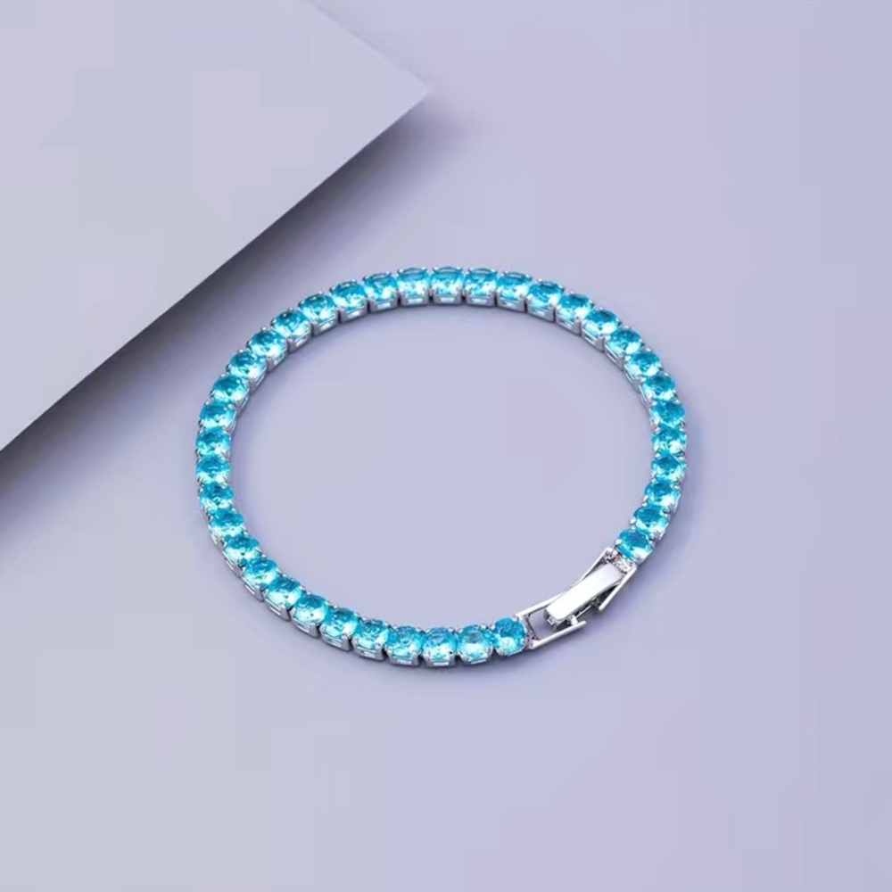 Beautiful Round Blue Topaz Bracelet In White Gold - Picture 9 of 12